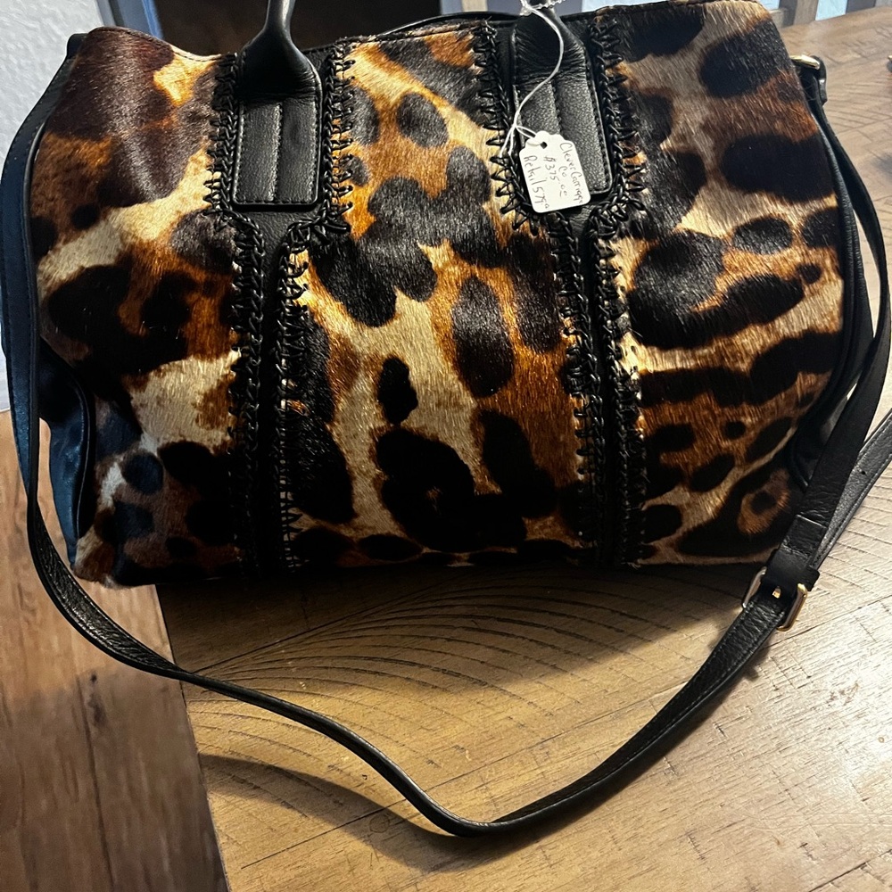Black leather Clever Carriage Company handbag
